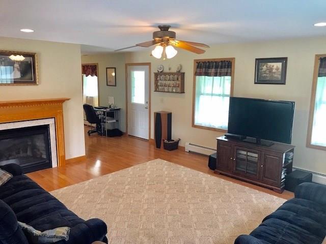 78 Field Road Sidney, ME 04330 - Photo 8 of 26 Living room with gas fireplace