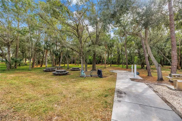 a view of a swimming pool with a patio