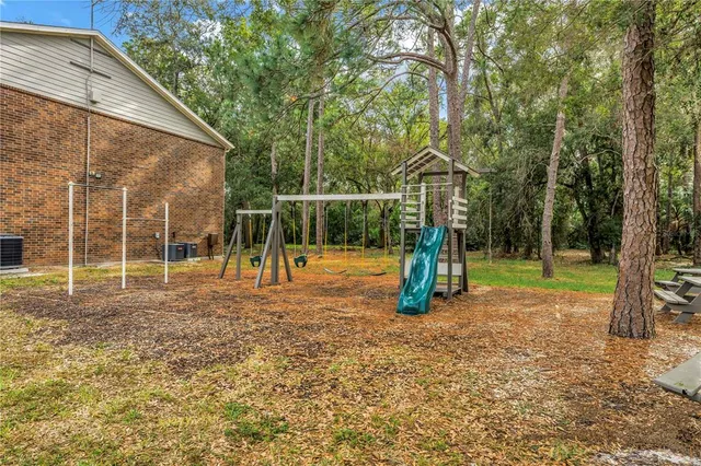 a sign that is on the wall of the house