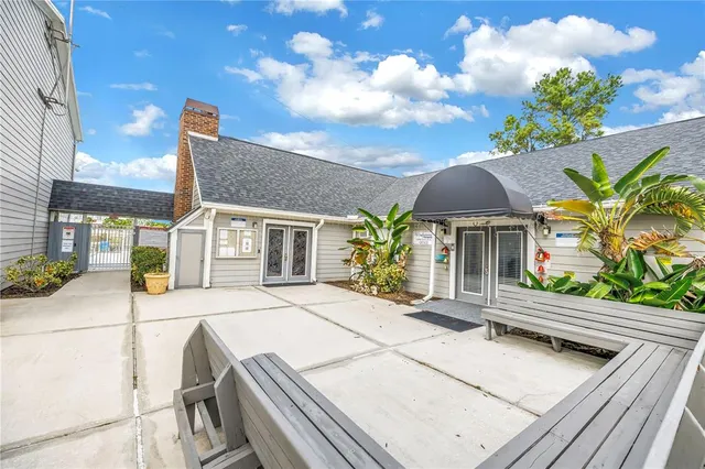 a view of a swimming pool with a lounge chairs
