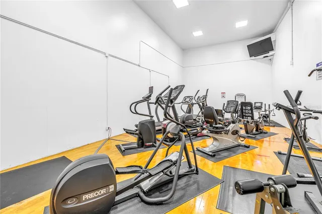 a view of a swimming pool with a lounge chair