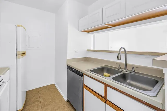 a kitchen with a stove and a sink