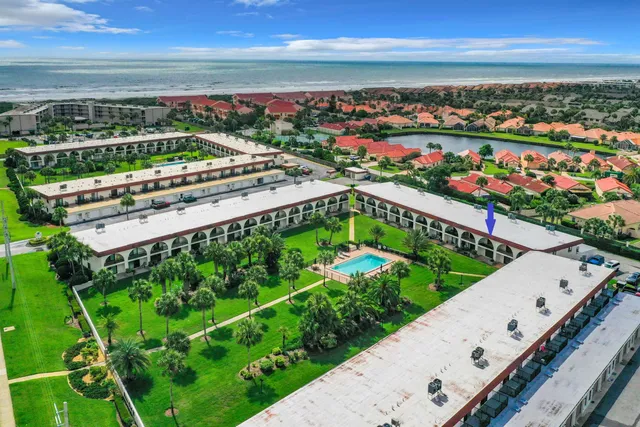 a view of a city with an ocean view