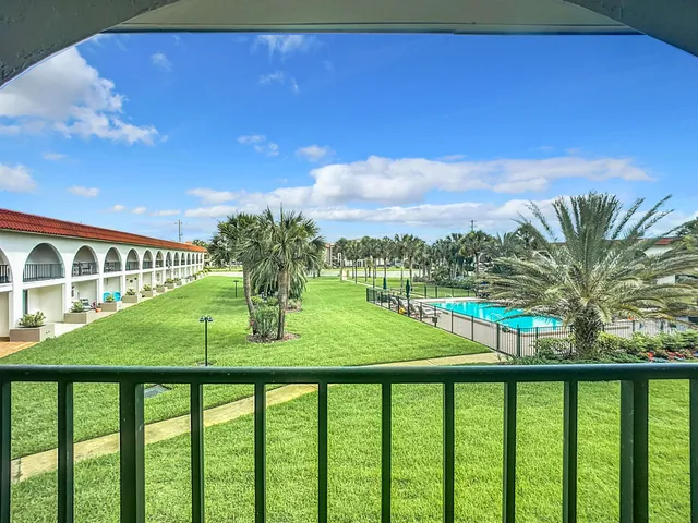a view of a balcony with an outdoor space