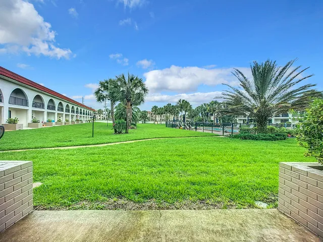 a view of a house with a garden