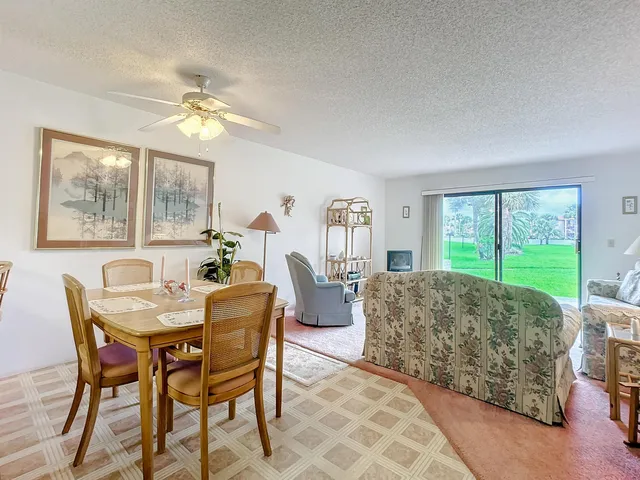 a white refrigerator freezer sitting inside of a kitchen