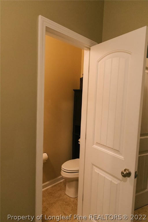 153 Shellbark Drive Spring Lake, NC 28390 - Photo 20 of 48 a bathroom with a toilet and a shower