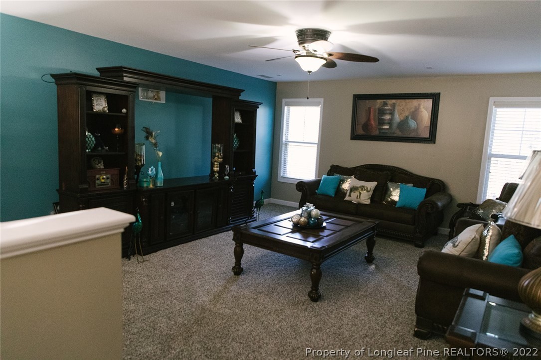 153 Shellbark Drive Spring Lake, NC 28390 - Photo 30 of 48 a living room with furniture and a window
