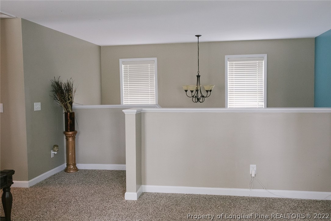 153 Shellbark Drive Spring Lake, NC 28390 - Photo 31 of 48 an empty room with windows and closet