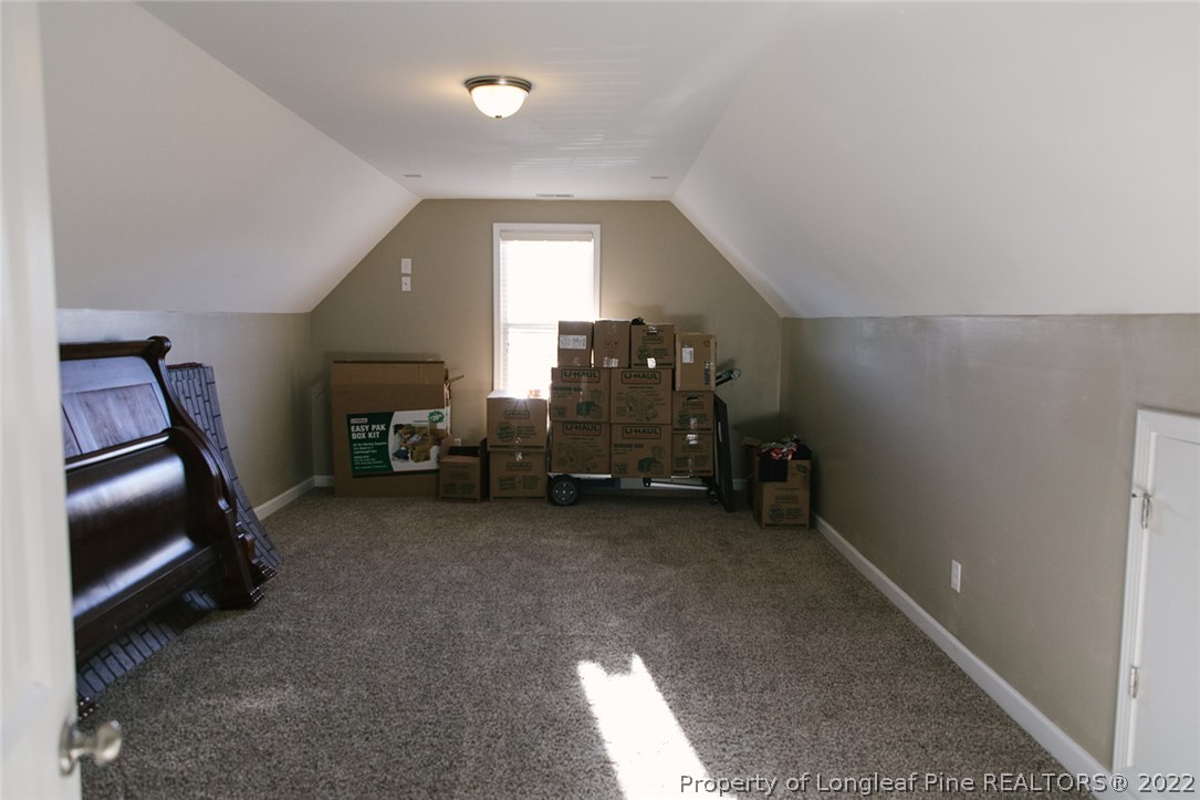 153 Shellbark Drive Spring Lake, NC 28390 - Photo 39 of 48 a view of a room with gym equipment