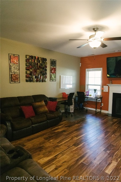153 Shellbark Drive Spring Lake, NC 28390 - Photo 9 of 48 a living room with furniture and a flat screen tv