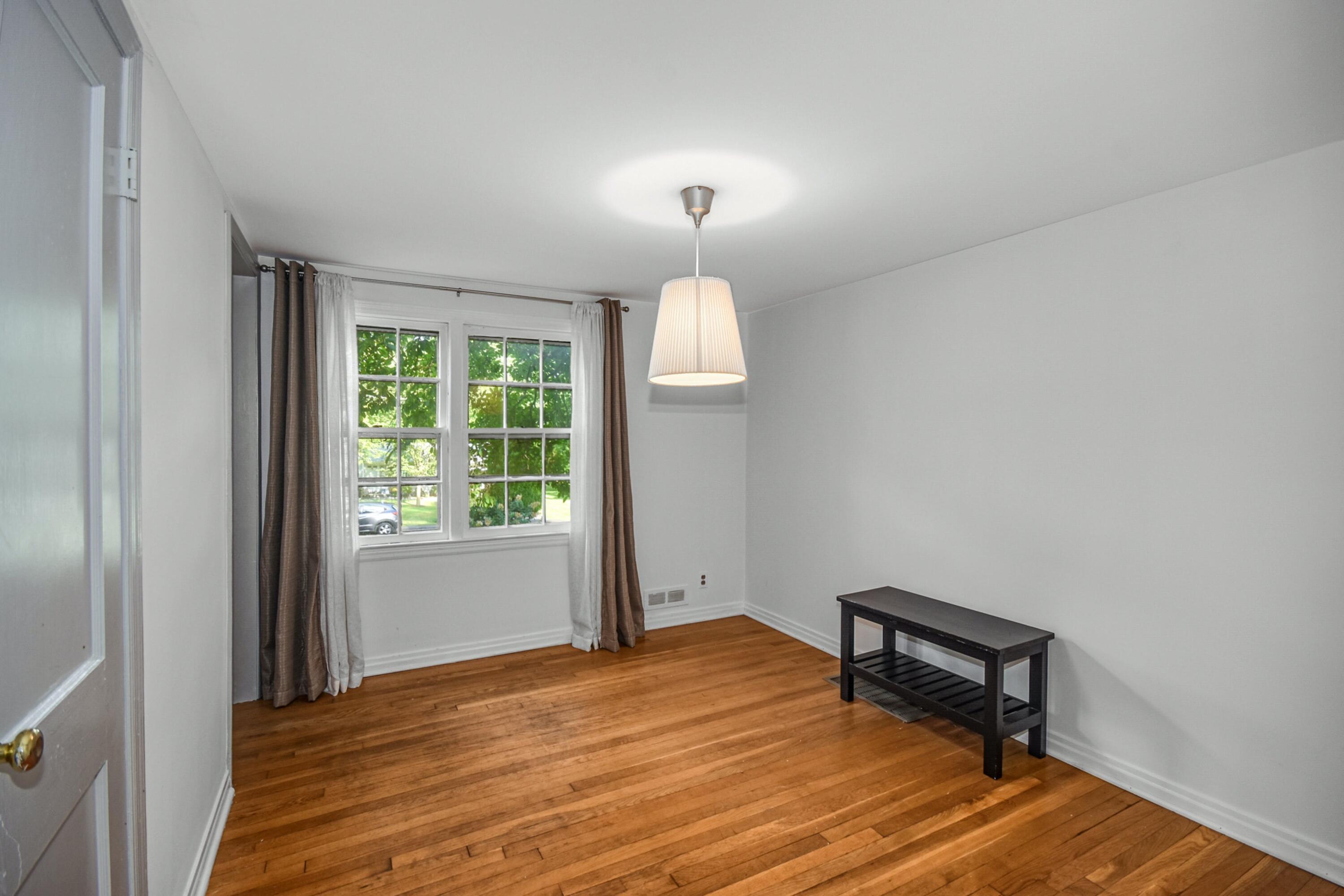 16 Burchard Lane Rowayton, CT 06853 - Photo 11 of 22 a bedroom with a bed and a window