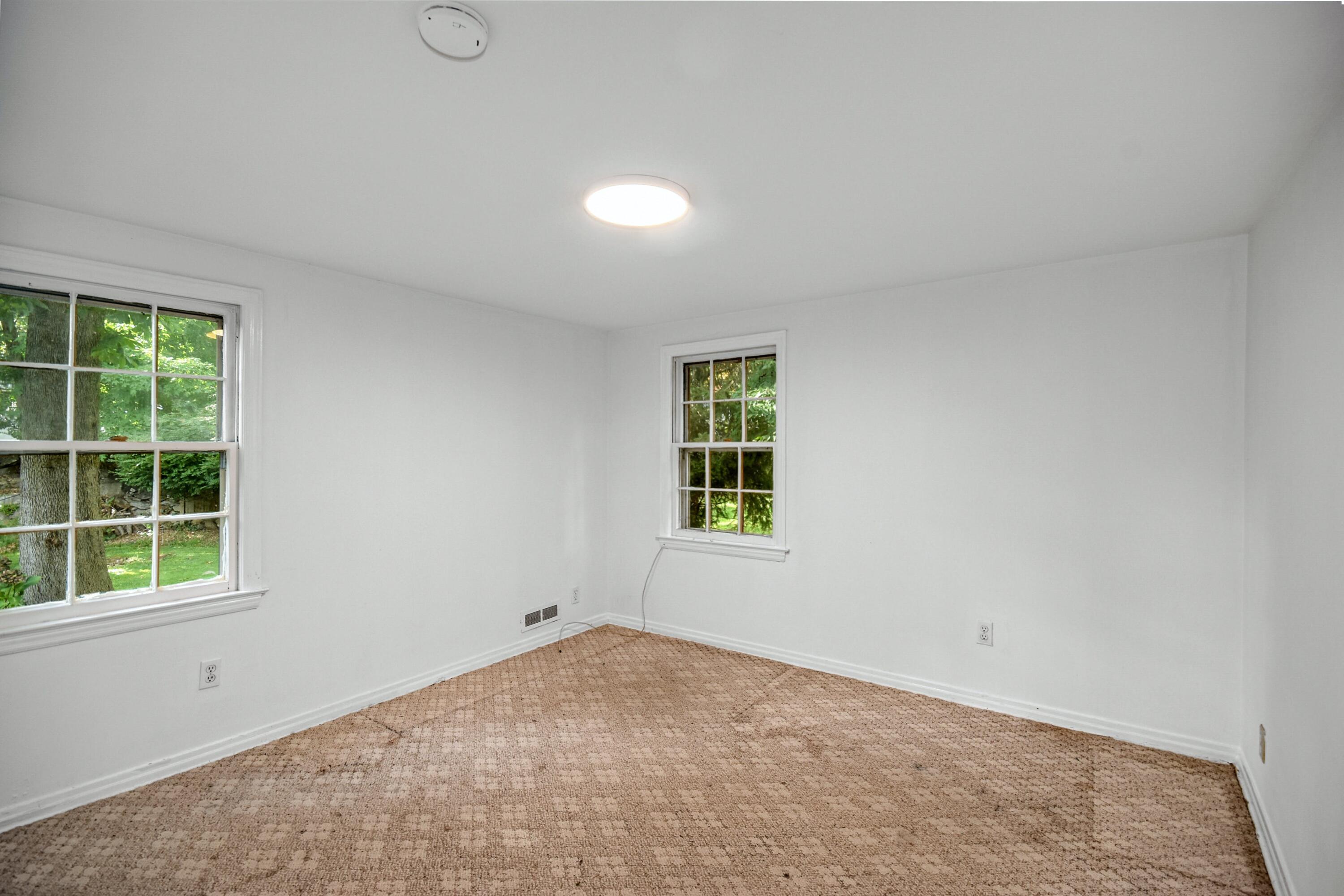 16 Burchard Lane Rowayton, CT 06853 - Photo 14 of 22 an empty room with a window