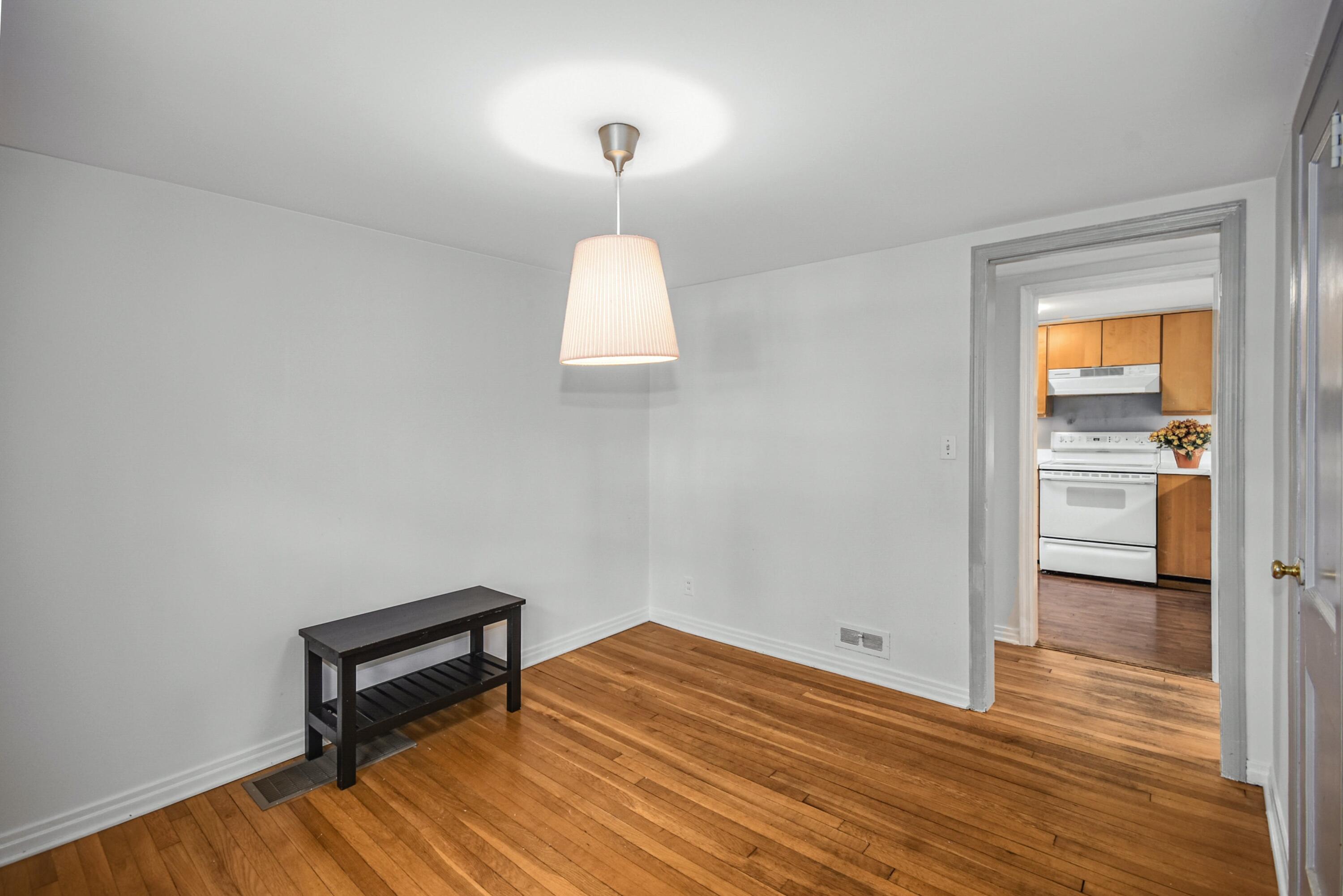 16 Burchard Lane Rowayton, CT 06853 - Photo 10 of 22 a room that has a bed and a chair in it