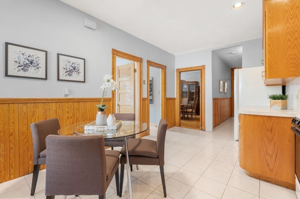 815 Centre Street, Unit 1 Boston, MA 02130 - Photo 15 of 30 a dining room with furniture and window