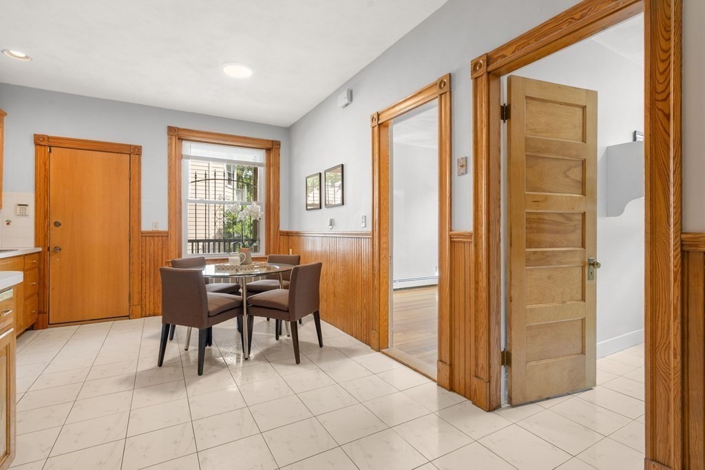 815 Centre Street, Unit 1 Boston, MA 02130 - Photo 17 of 30 a dining room with furniture and window