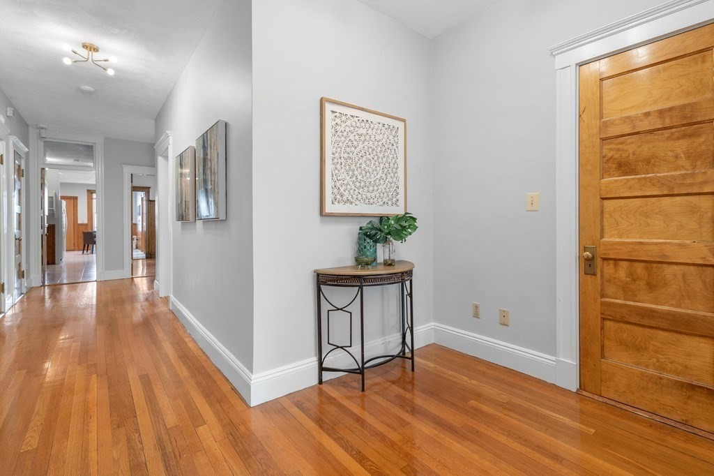 815 Centre Street, Unit 1 Boston, MA 02130 - Photo 19 of 30 a view of an entryway with wooden floor