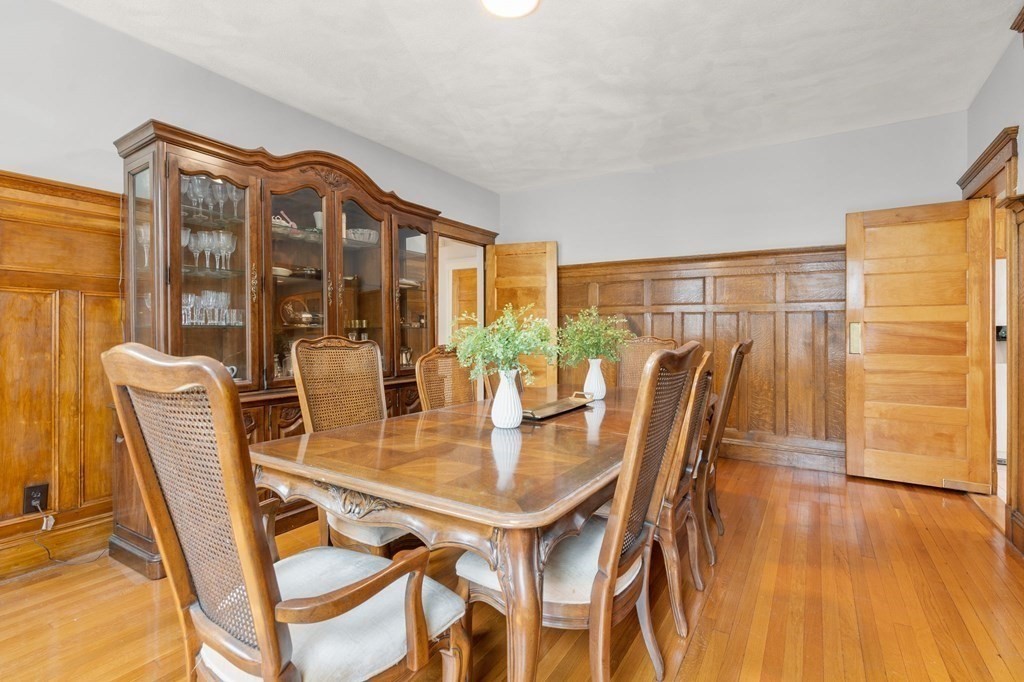 815 Centre Street, Unit 1 Boston, MA 02130 - Photo 7 of 30 a dining room with furniture and wooden floor