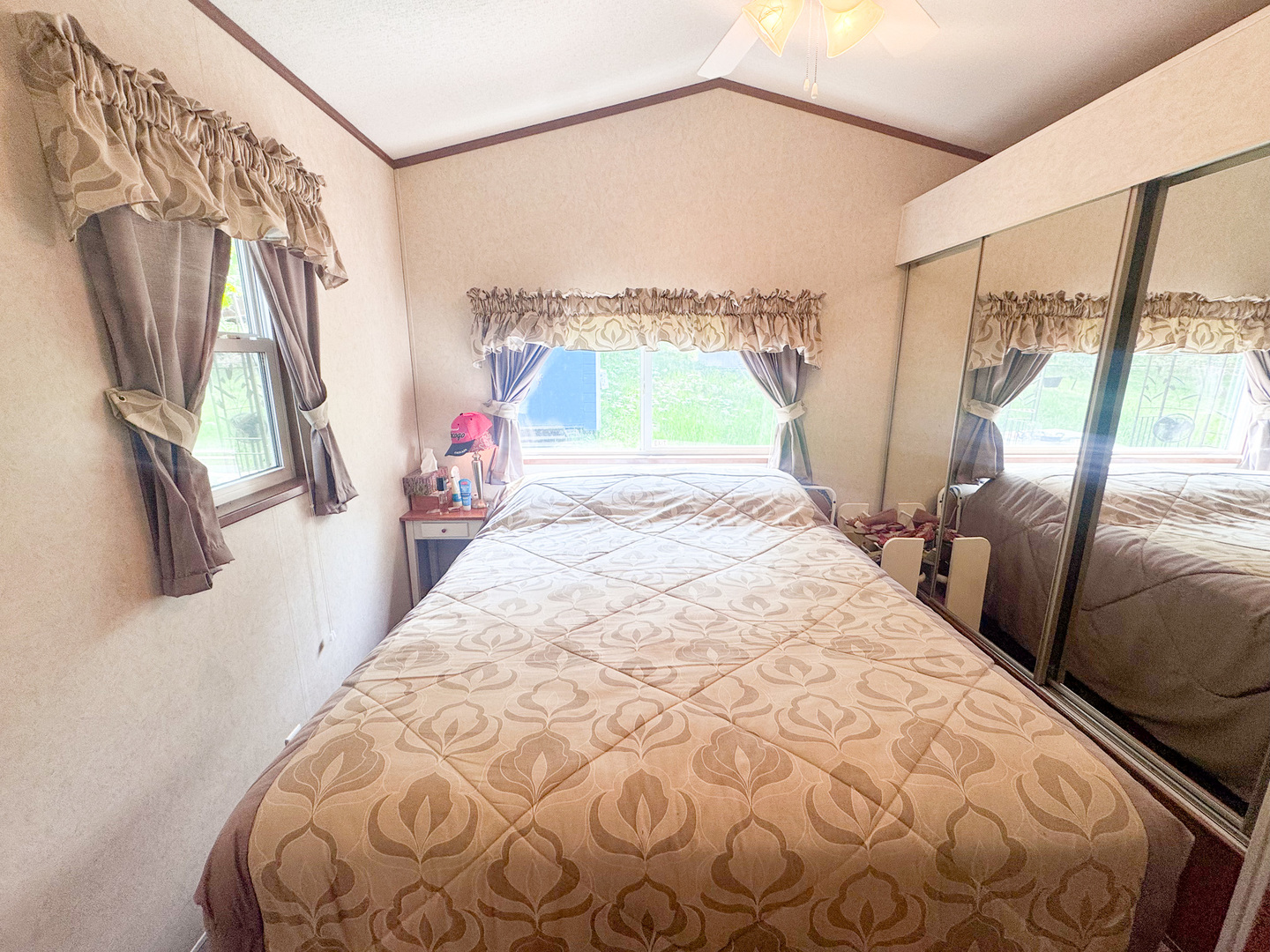 7-98 Woodhaven Sublette, IL 61367 - Photo 11 of 23 a bed sitting in a bedroom next to a window