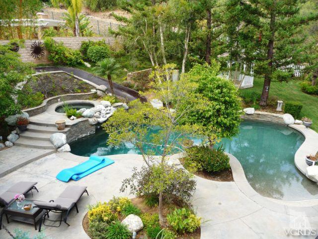 567 Oak Tree Court Simi Valley, CA 93065 - Photo 2 of 17 a view of yard with swimming pool