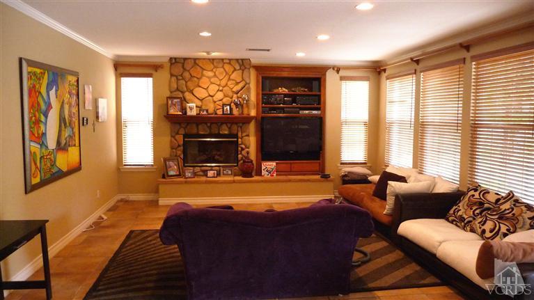 567 Oak Tree Court Simi Valley, CA 93065 - Photo 14 of 17 a living room with furniture fireplace and flat screen tv