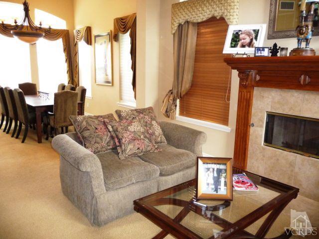 567 Oak Tree Court Simi Valley, CA 93065 - Photo 15 of 17 a living room with furniture and a fireplace