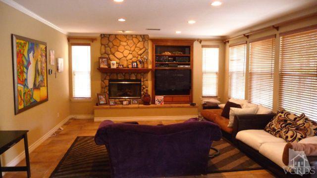 567 Oak Tree Court Simi Valley, CA 93065 - Photo 5 of 17 a living room with fireplace furniture and a large window
