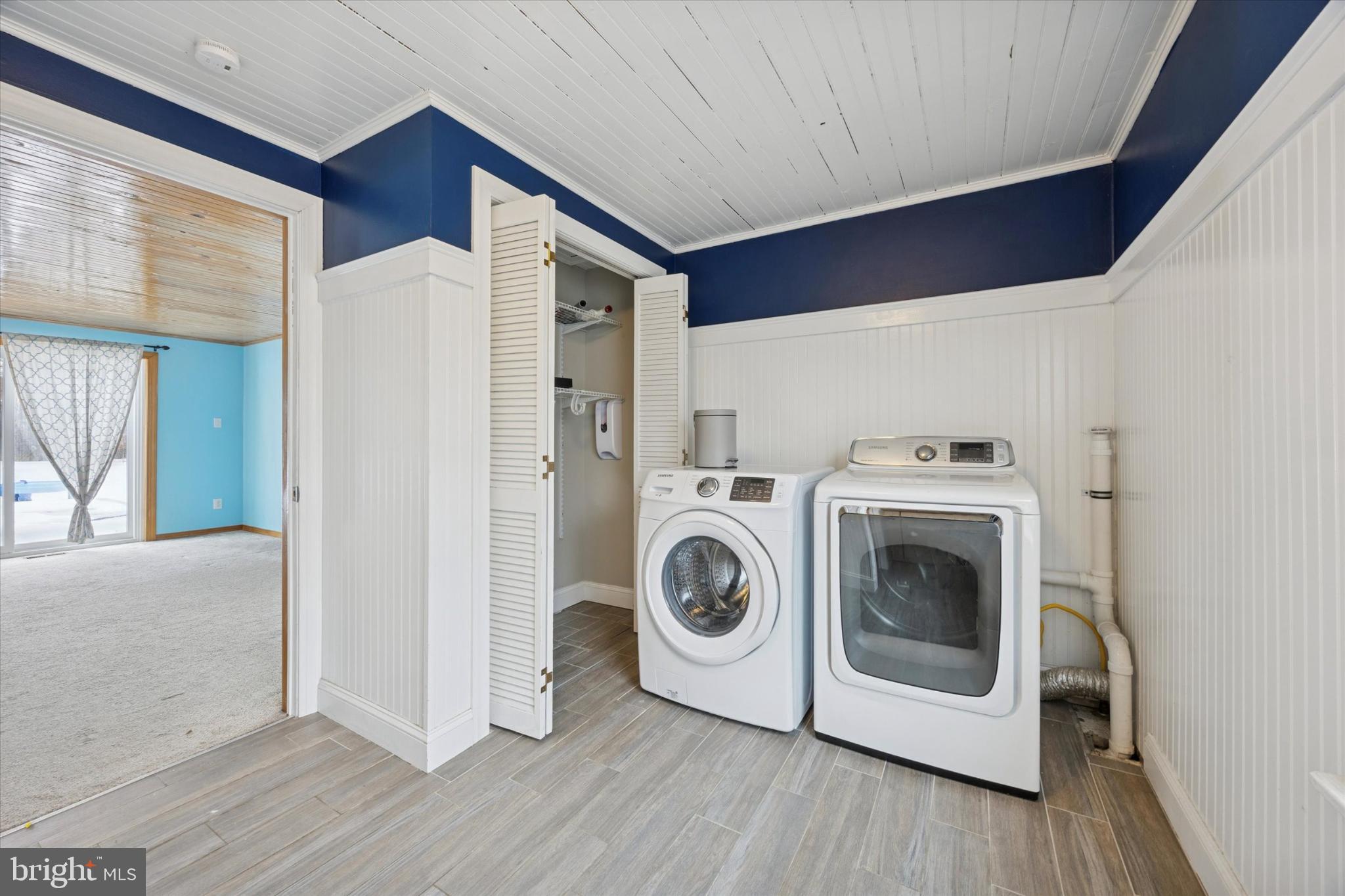 606 West Springfield Road Springfield, PA 19064 - Photo 11 of 25 a utility room with dryer and washer