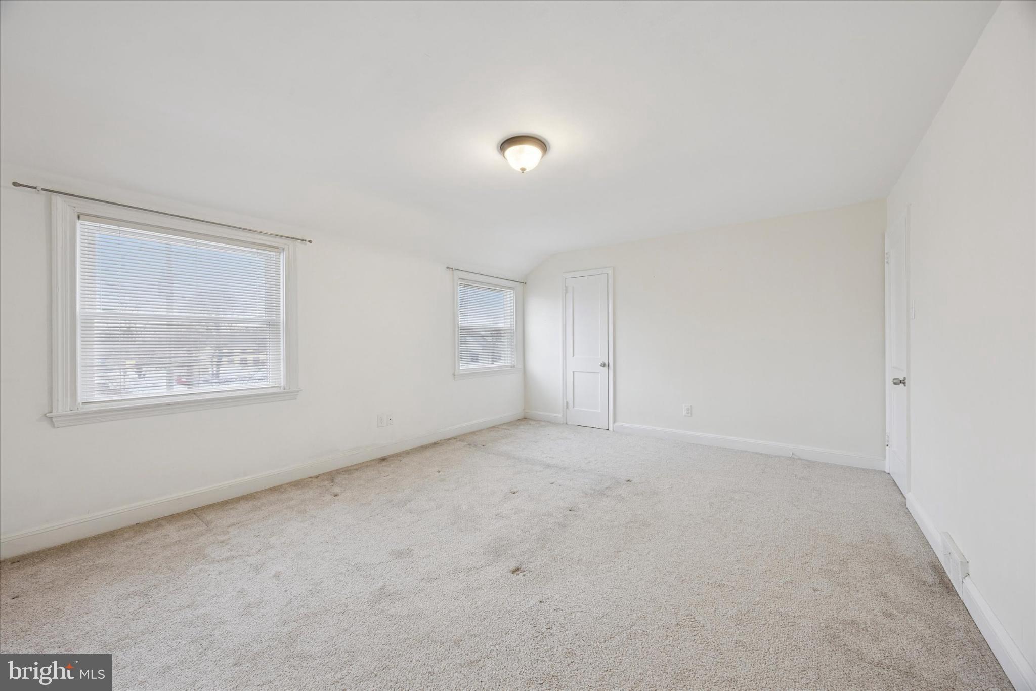 606 West Springfield Road Springfield, PA 19064 - Photo 17 of 25 an empty room with a window