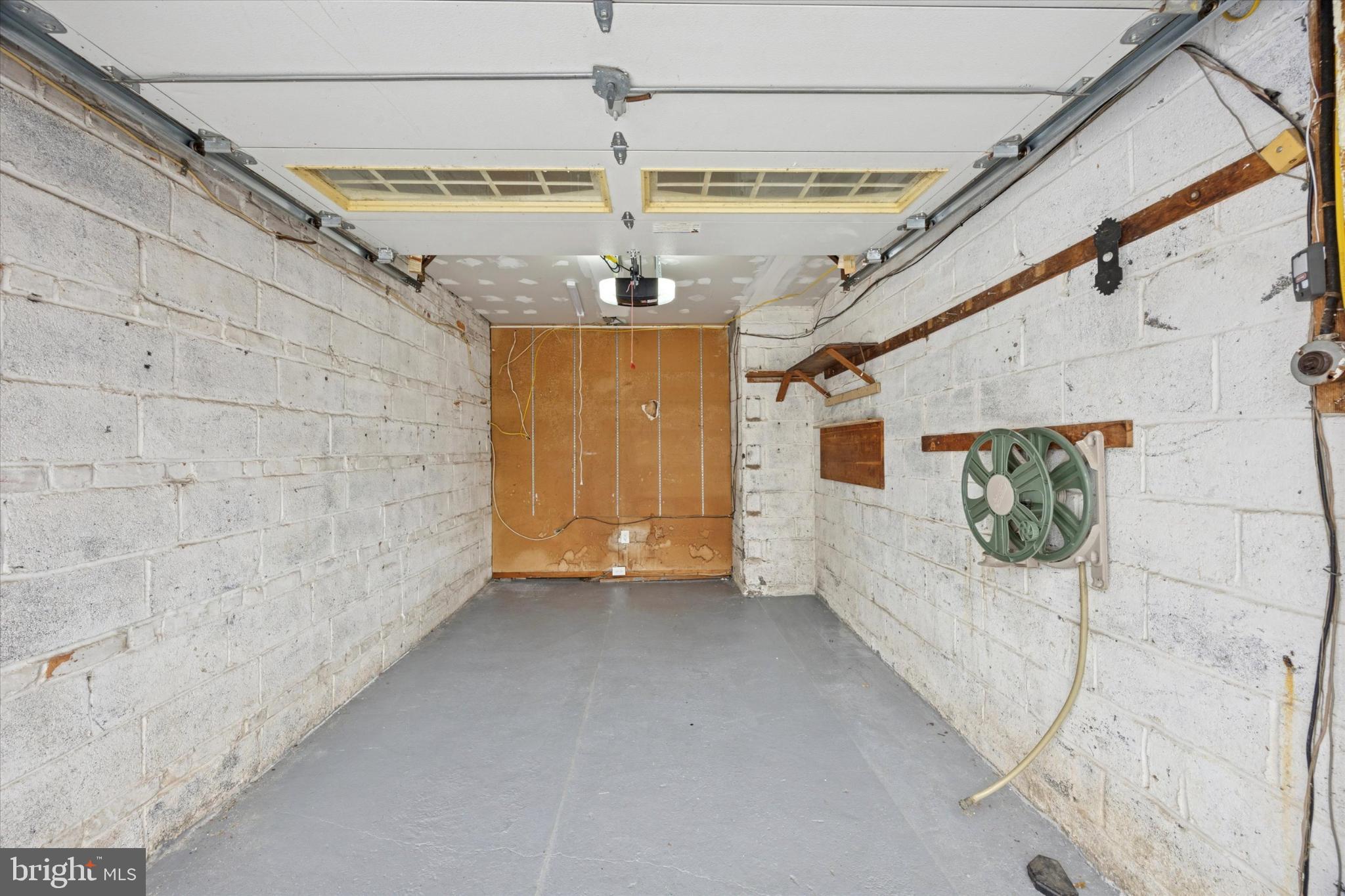 606 West Springfield Road Springfield, PA 19064 - Photo 24 of 25 a view of a back yard and a garage