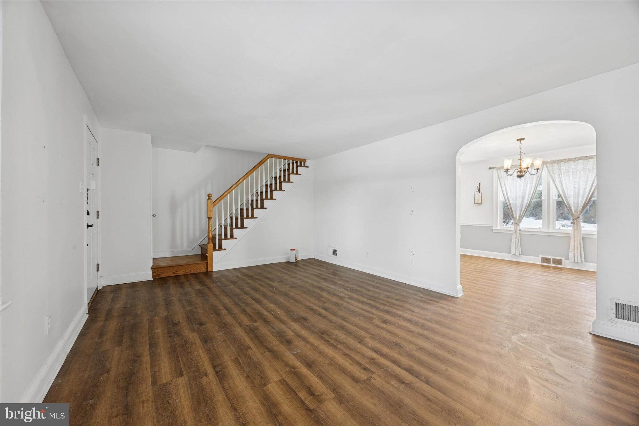 606 West Springfield Road Springfield, PA 19064 - Photo 3 of 25 a view of empty room with wooden floor