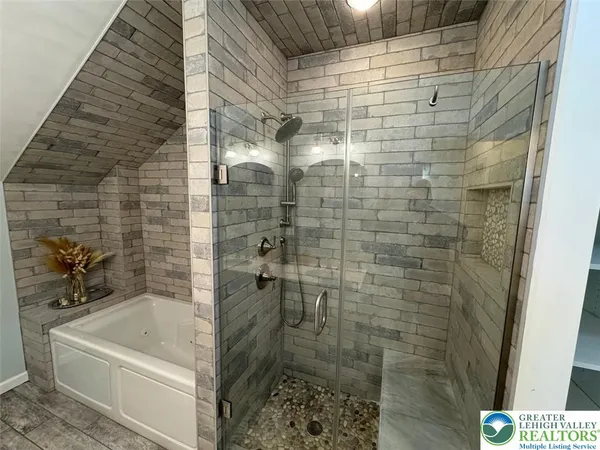 a bathroom with a bathtub