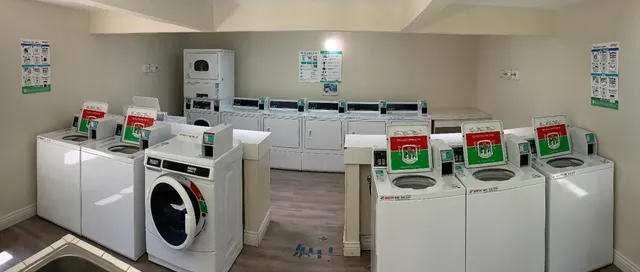 a view of a bathroom with a sink and wooden floor
