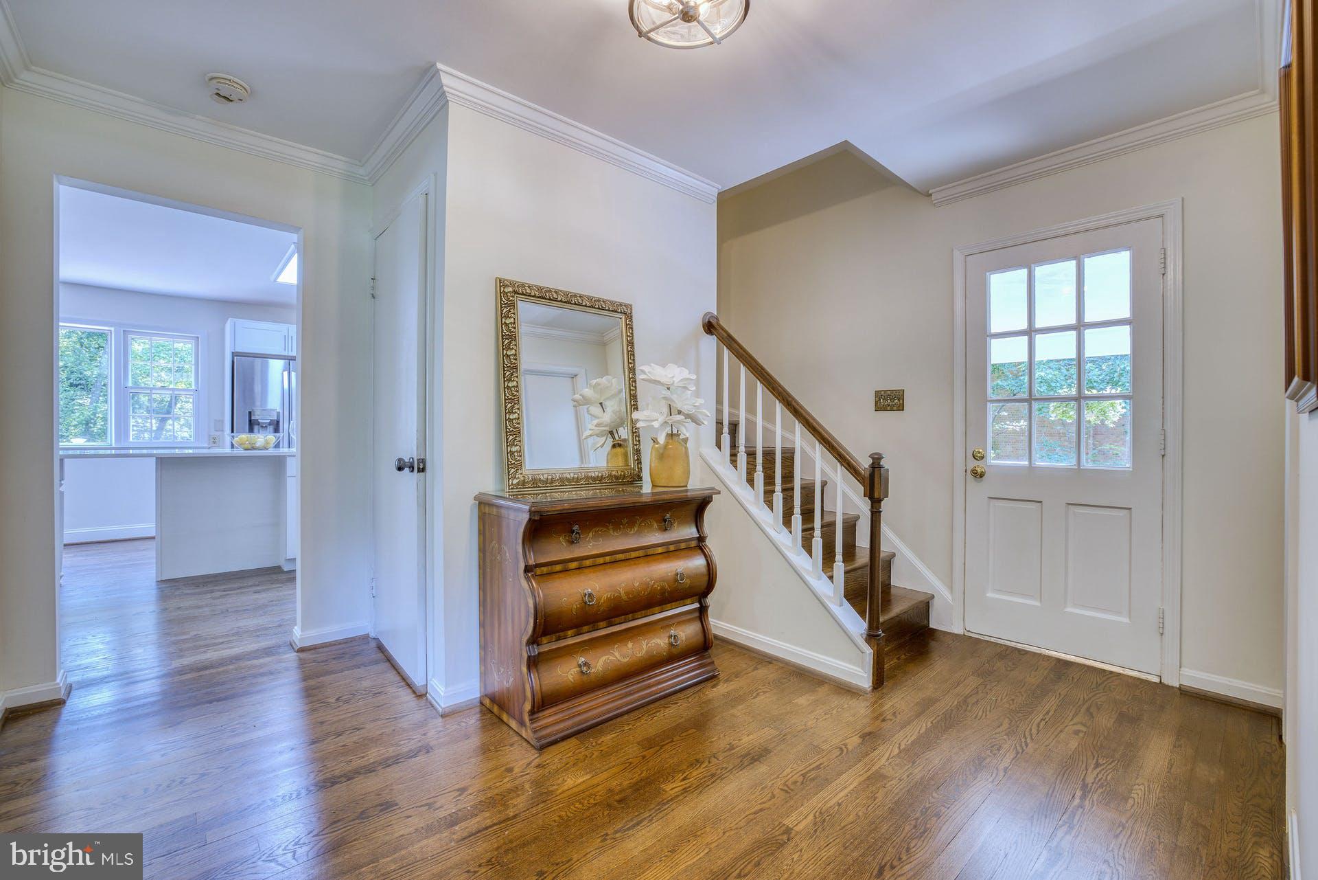1629 Courtland Road Alexandria, VA 22306 - Photo 23 of 59 Pristine foyer w/ powder room, and door to carport