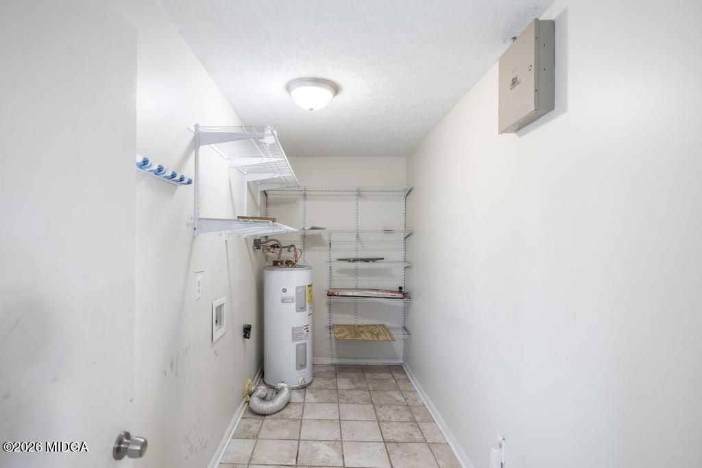 112 Prairie Boulevard Centerville, GA 31028 - Photo 16 of 32 a room with cabinets and wooden floor