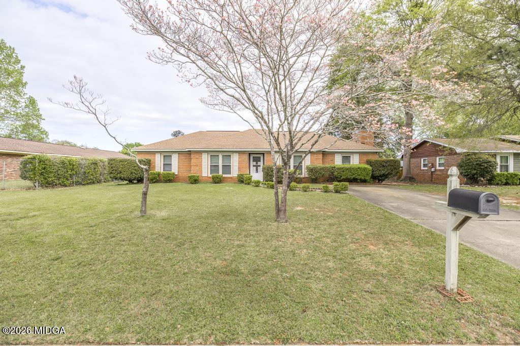 112 Prairie Boulevard Centerville, GA 31028 - Photo 2 of 32 a view of a yard in front of a house