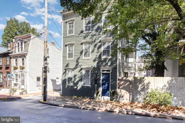 a street view along with residential houses