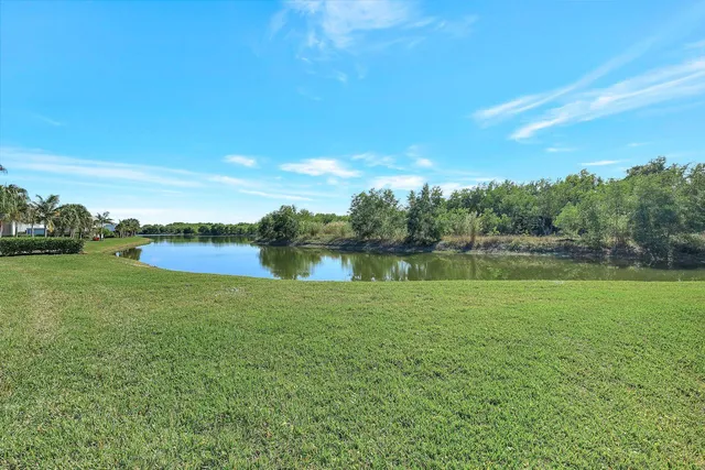 a view of a lake with a big yard