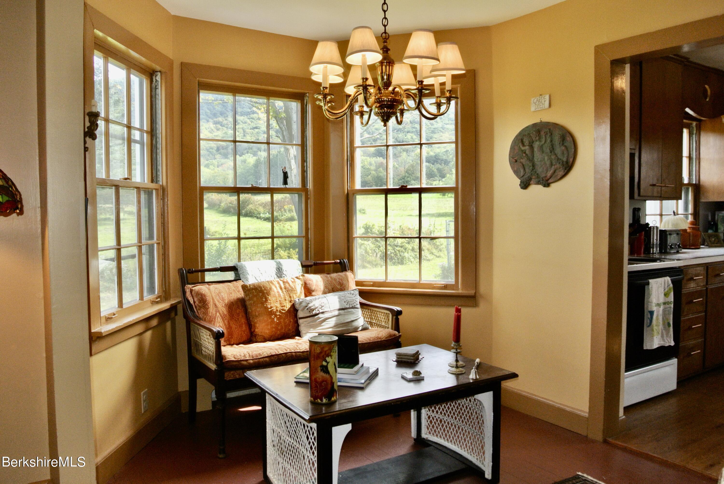 105 Yokun Road Richmond, MA 01201 - Photo 13 of 37 a living room with furniture and a window