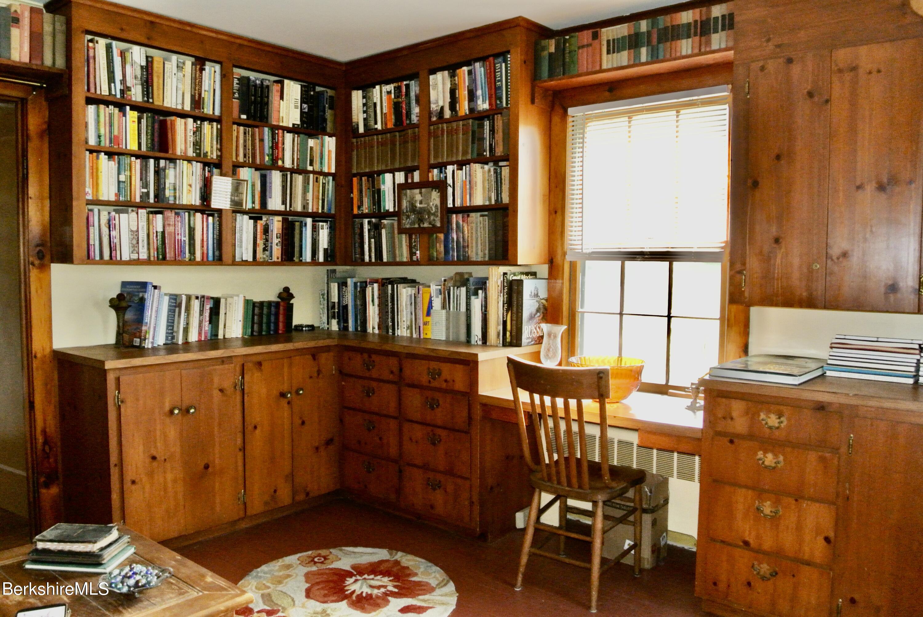 105 Yokun Road Richmond, MA 01201 - Photo 15 of 37 a workspace with furniture and window