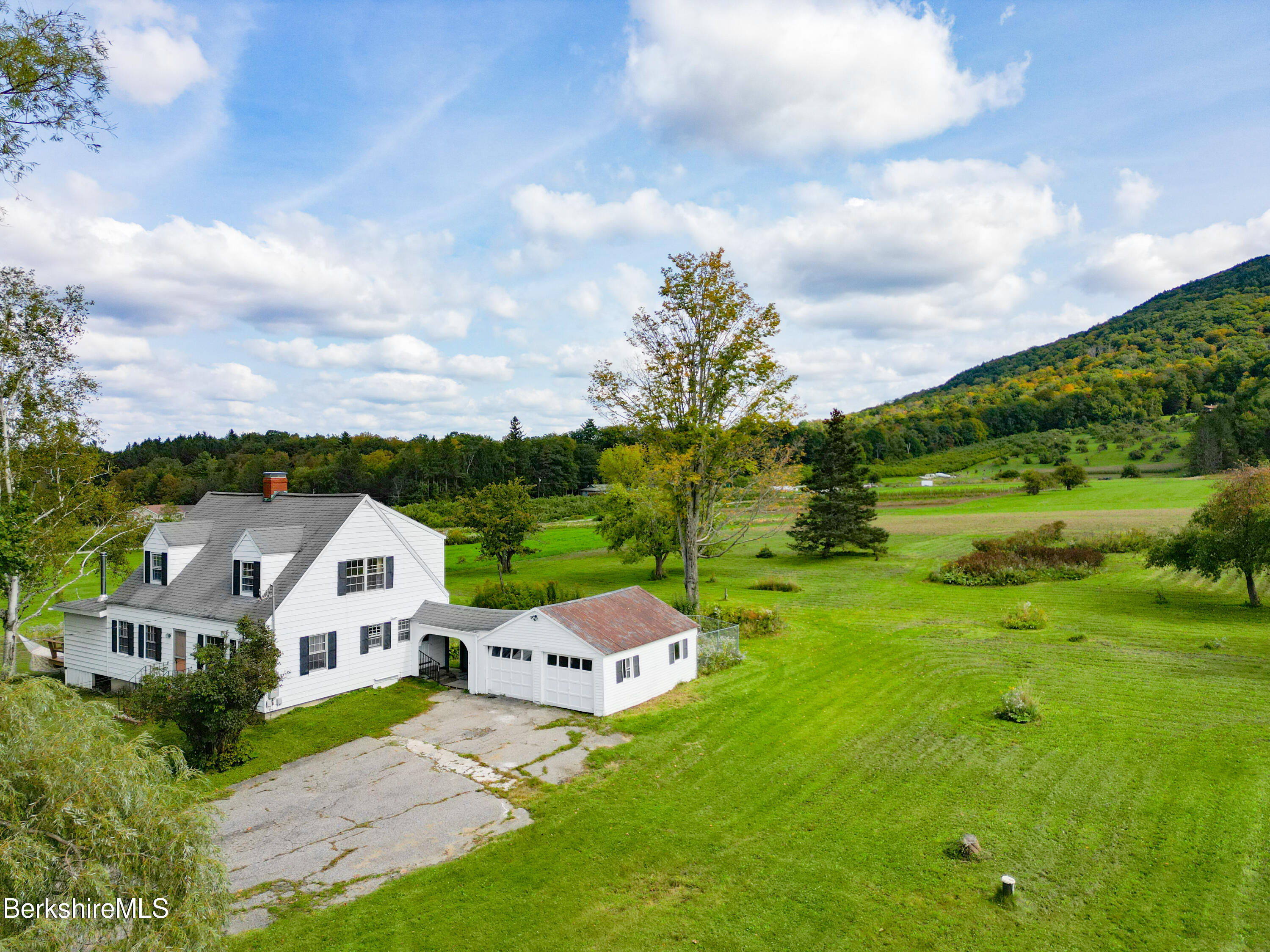 105 Yokun Road Richmond, MA 01201 - Photo 37 of 37 a aerial view of a house with big yard