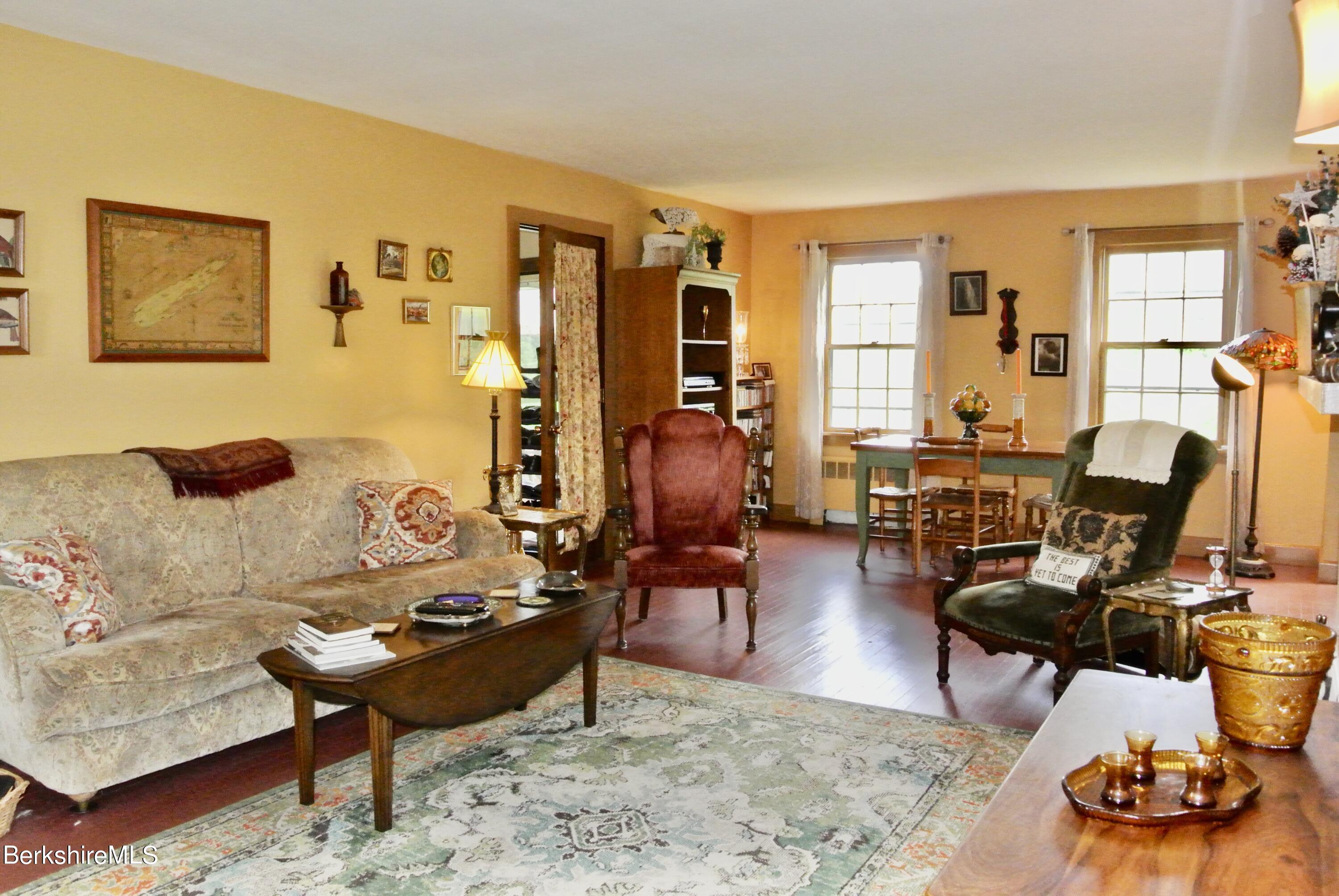 105 Yokun Road Richmond, MA 01201 - Photo 8 of 37 a living room with furniture and a large window