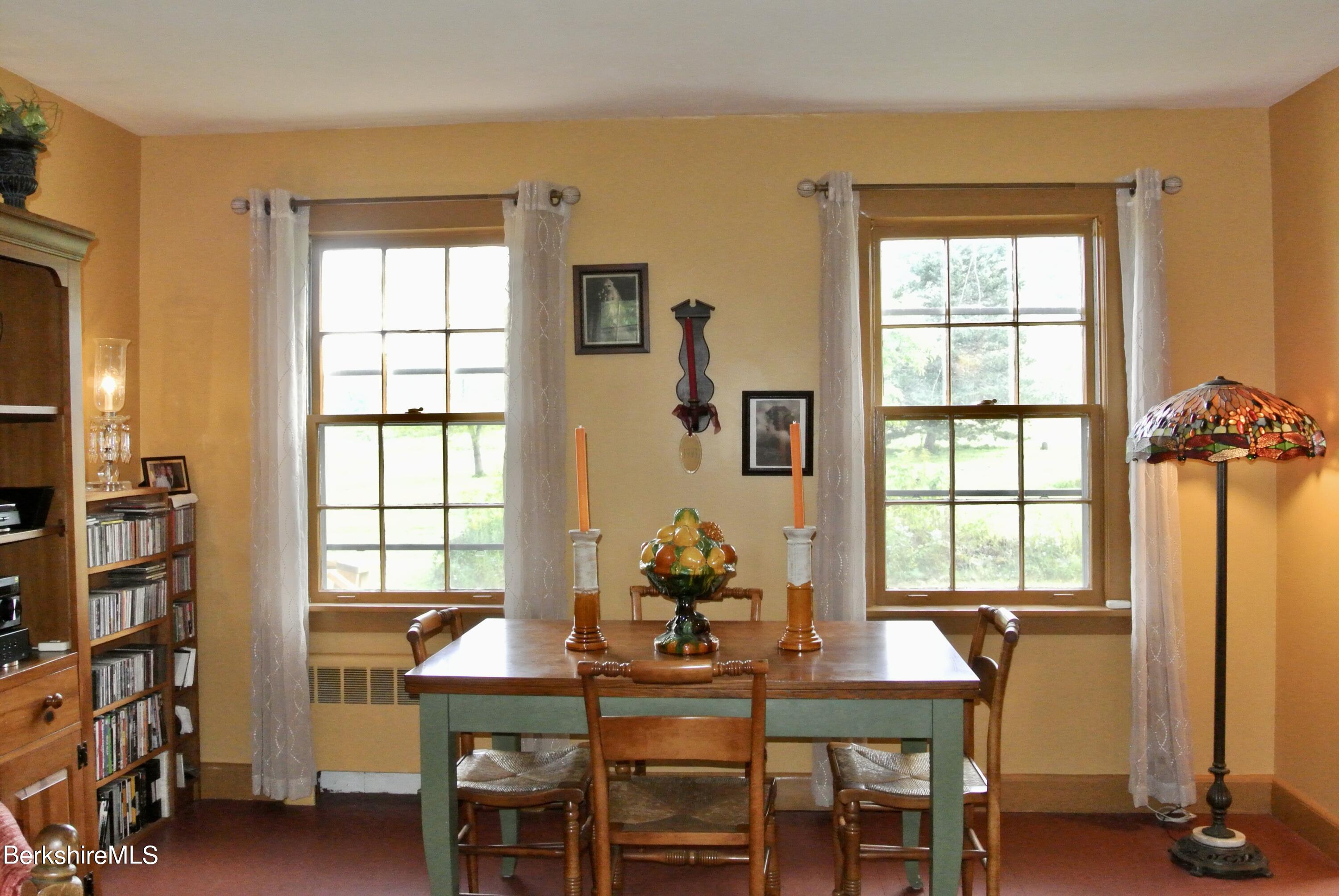 105 Yokun Road Richmond, MA 01201 - Photo 9 of 37 a dining room with furniture and window