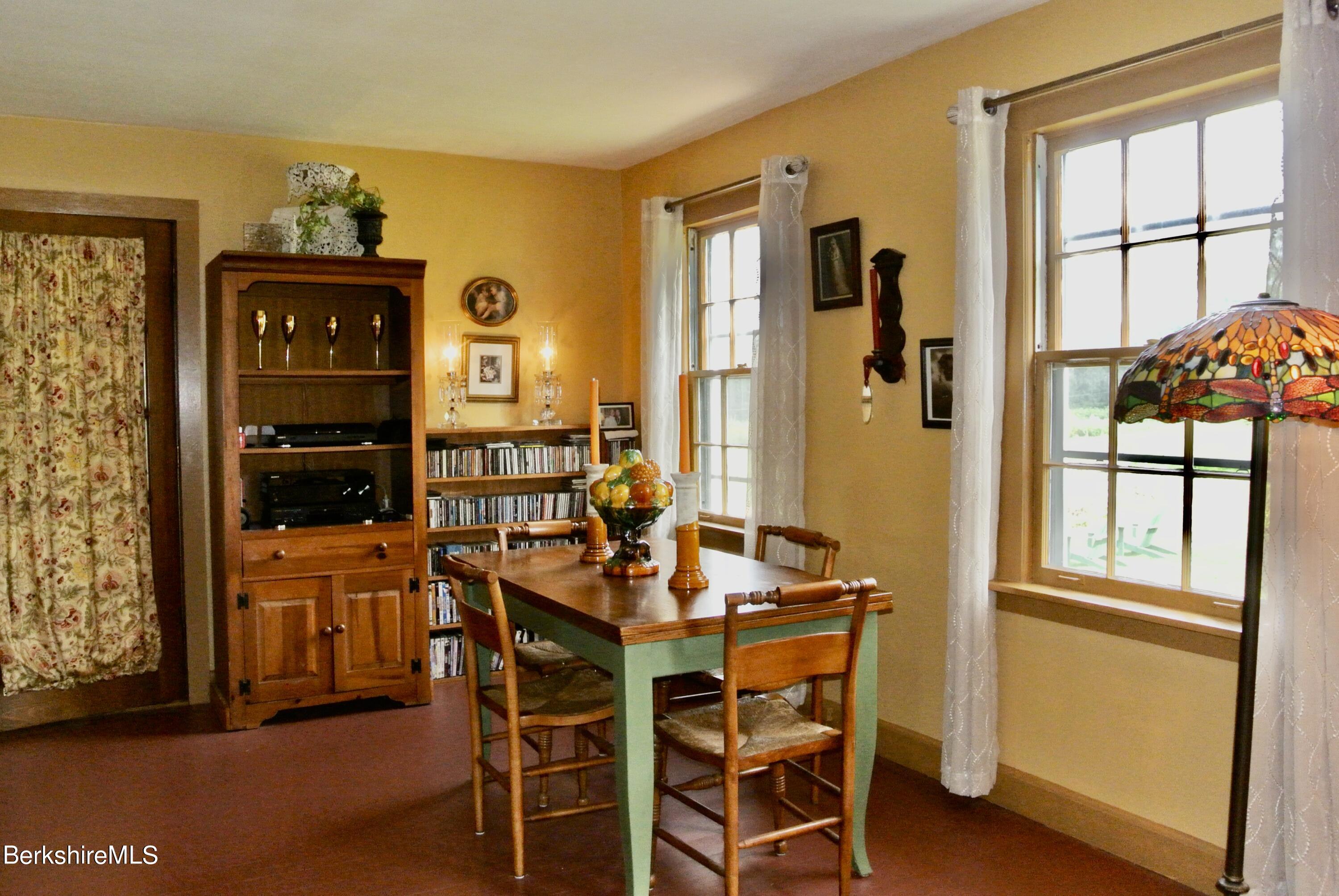 105 Yokun Road Richmond, MA 01201 - Photo 10 of 37 a dining room with furniture and window