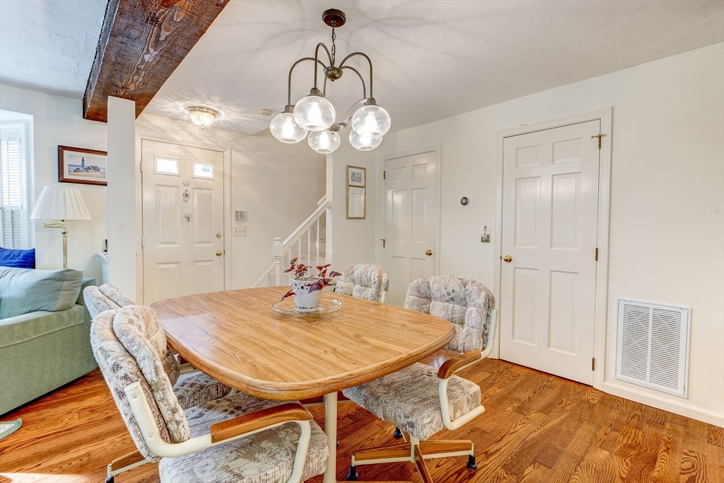 138 Quincy Shore Drive, Unit 170 Quincy, MA 02171 - Photo 11 of 41 a view of a dining room with furniture