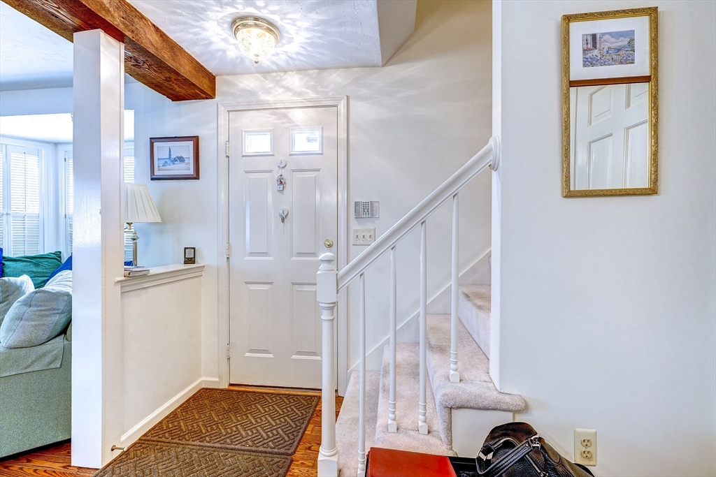 138 Quincy Shore Drive, Unit 170 Quincy, MA 02171 - Photo 19 of 41 a view of front door and bedroom