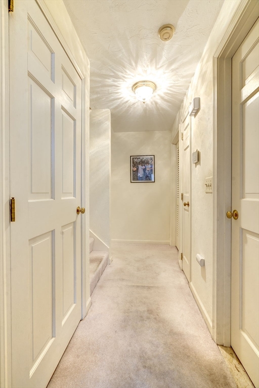 138 Quincy Shore Drive, Unit 170 Quincy, MA 02171 - Photo 28 of 41 a view of a hallway