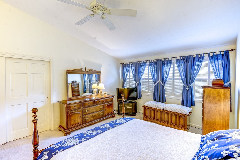 138 Quincy Shore Drive, Unit 170 Quincy, MA 02171 - Photo 34 of 41 a living room with furniture and a window