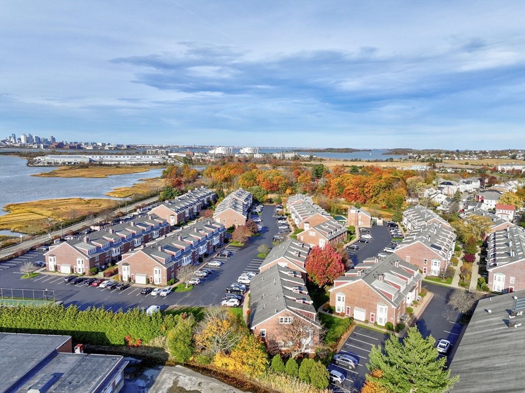138 Quincy Shore Drive, Unit 170 Quincy, MA 02171 - Photo 40 of 41 an aerial view of residential building and lake view