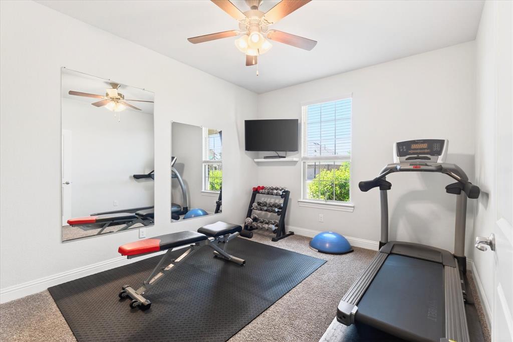 2816 Permian Road Aubrey, TX 76227 - Photo 18 of 36 Aerial perspective of suburban area featuring a pool